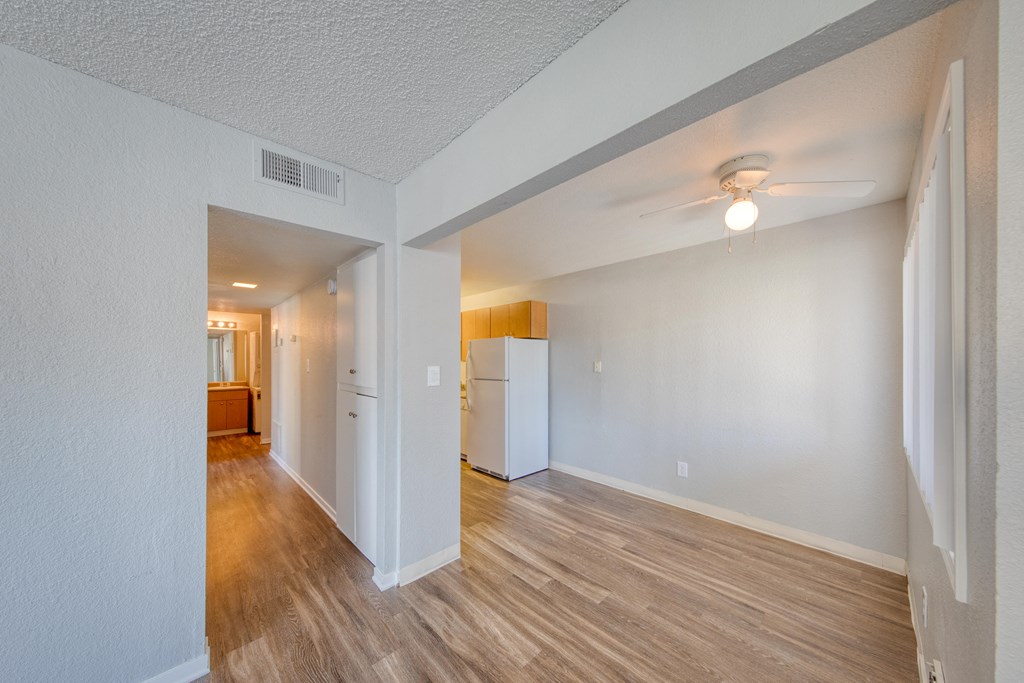 a kitchen and living room in a 555 waverly unit