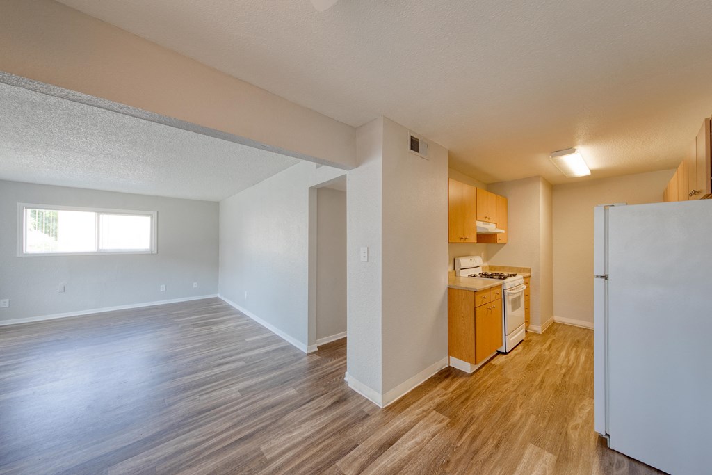 a kitchen and living room in a 555 waverly unit