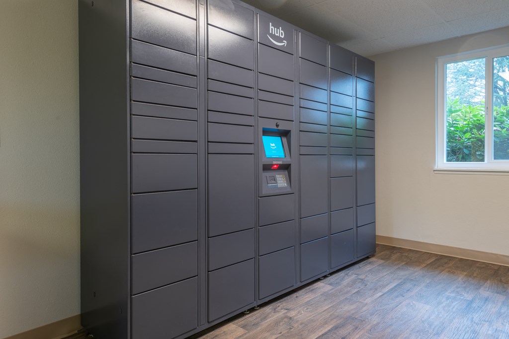 a row of lockers in a room with a window