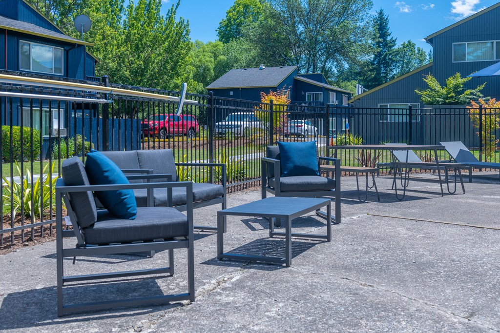the patio at the whispering winds apartments in pearland, tx