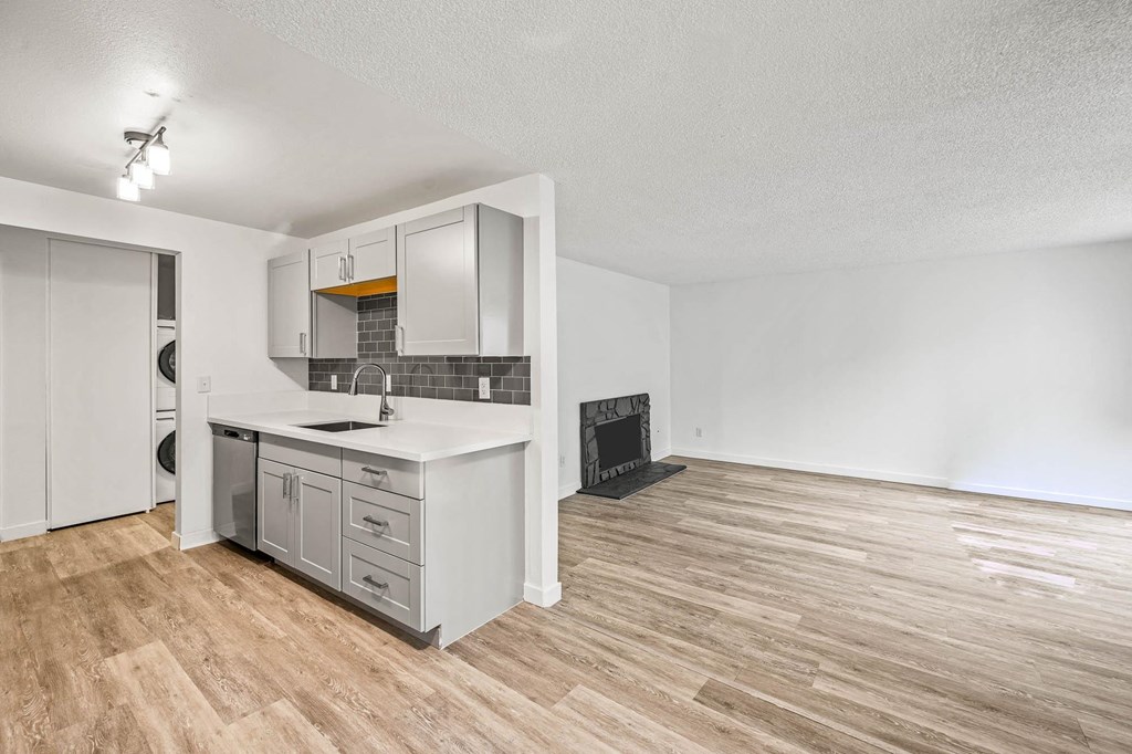 a kitchen and living room in a 555 waverly unit