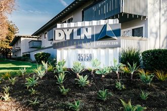 an image of the front of a building with a sign that says dylan apartments