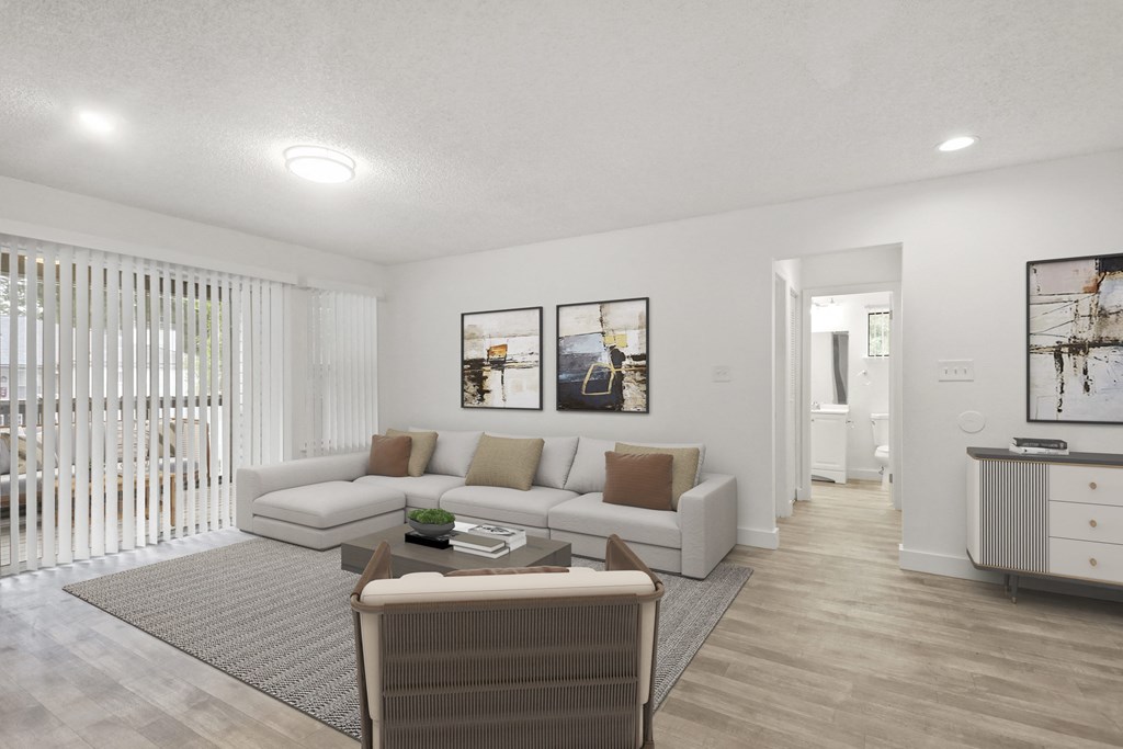 a living room with a couch and a table