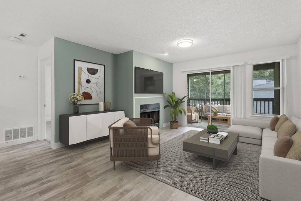 the living room of an apartment with a couch and a coffee table
