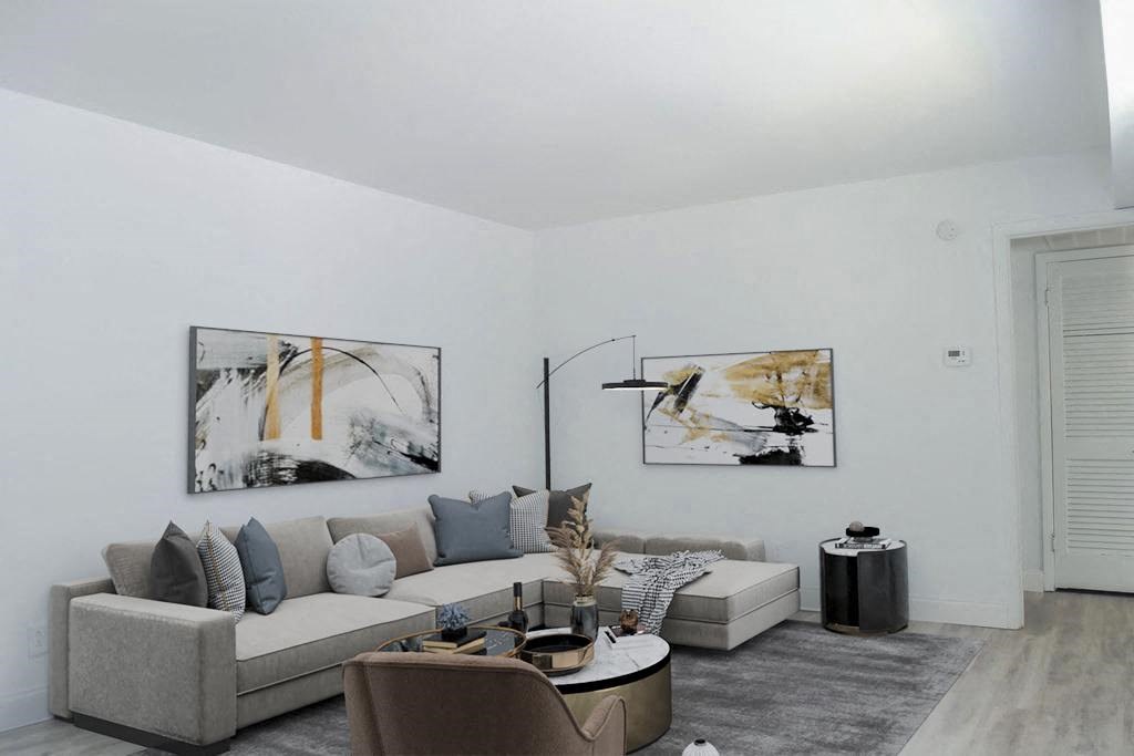 a living room with a couch and a table