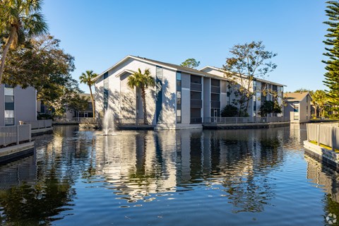 the building where the motel is located has a fountain in the water