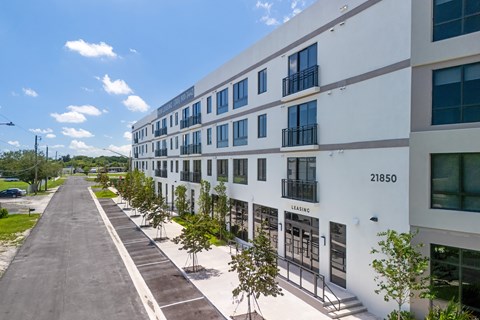 A street view of a building with the number 21850 on it.