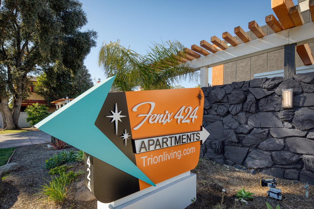 a sign in front of a building