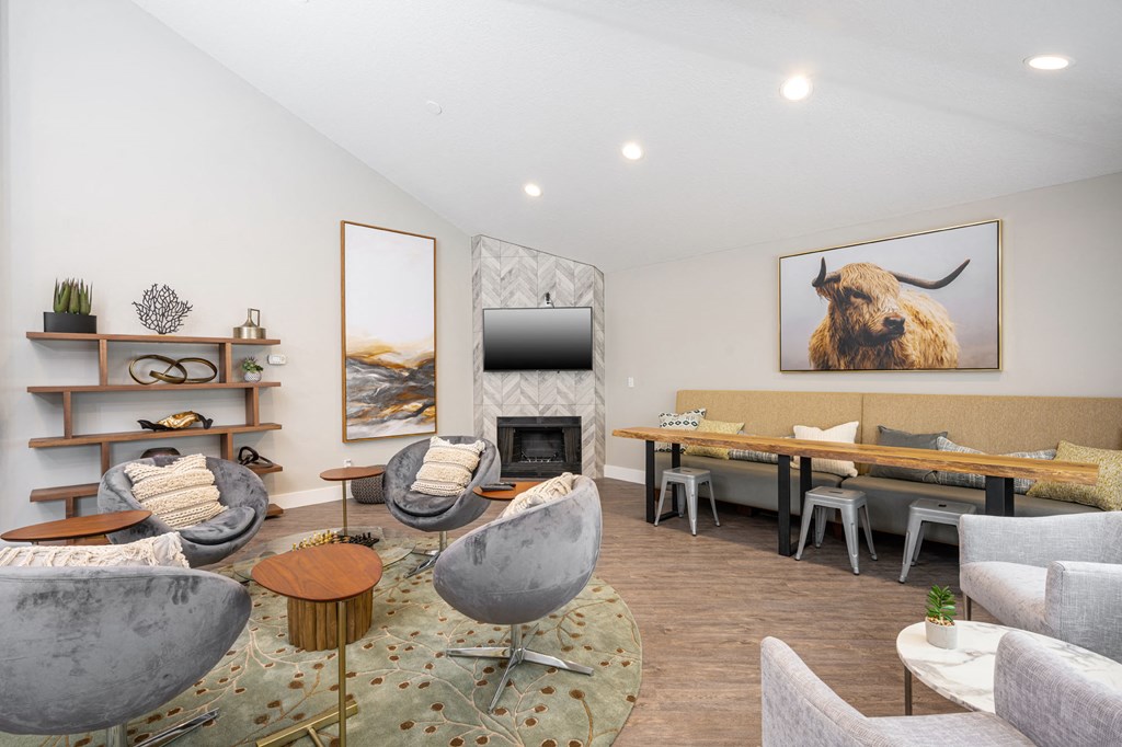 a living room filled with furniture and a fire place