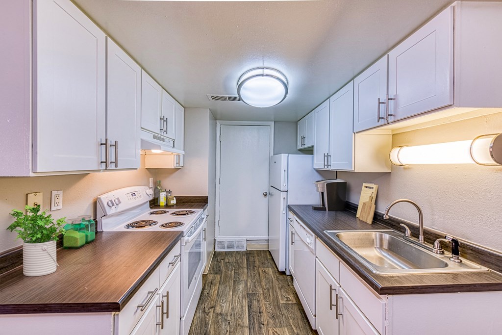 the preserve at ballantyne commons apartment kitchen with white cabinets