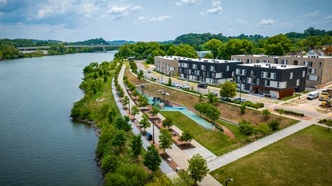 a view from above of a building complex along a river