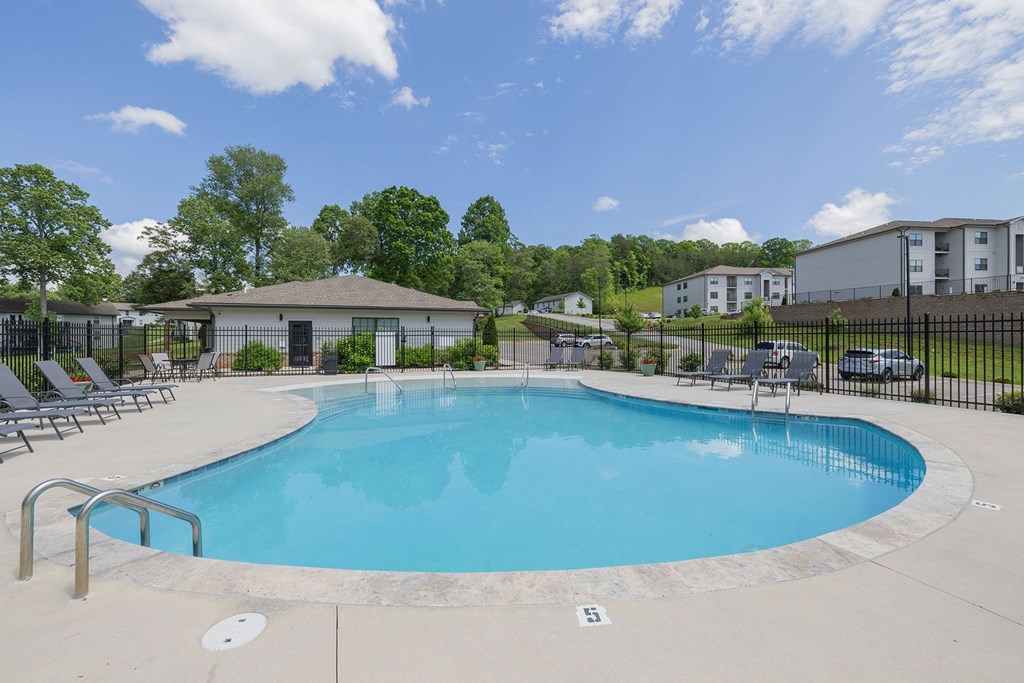our apartments have a resort style pool with chaise lounge chairs