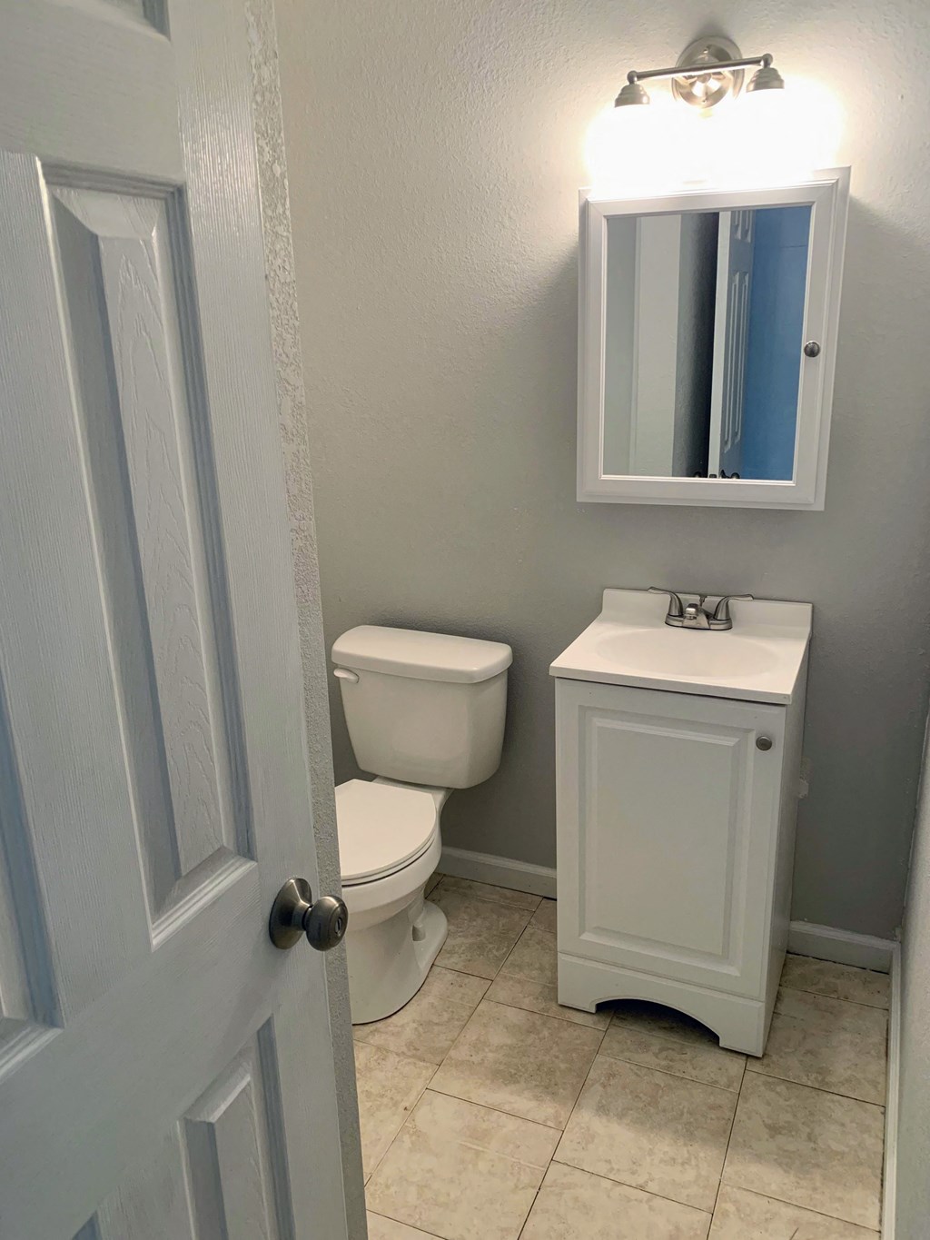 a small bathroom with a toilet and a sink