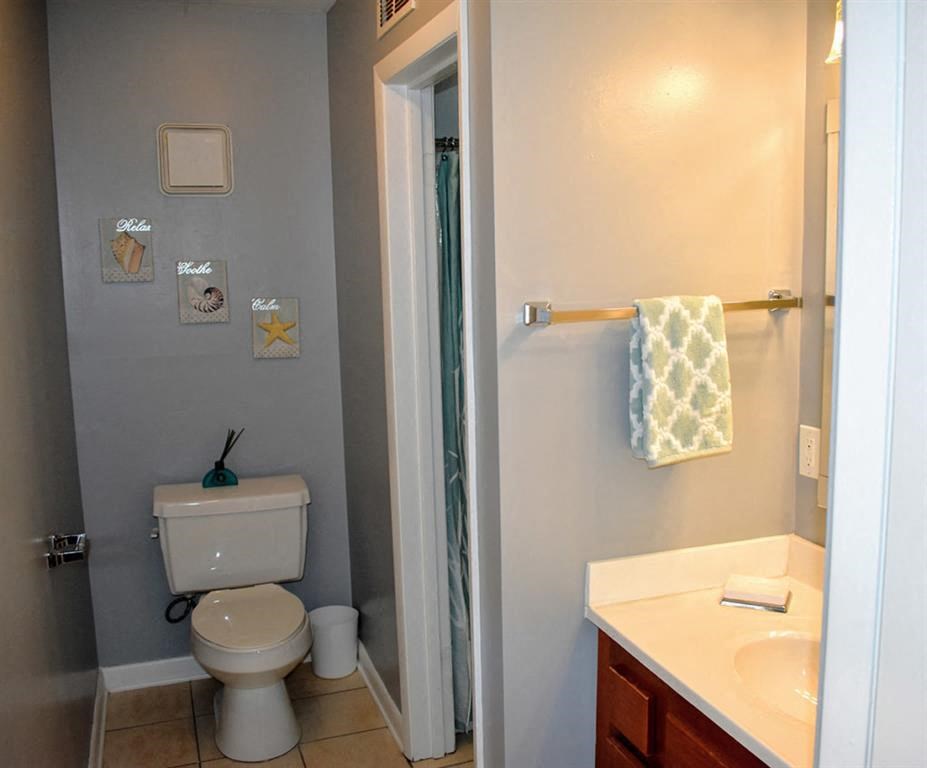 a bathroom with a toilet and a sink
