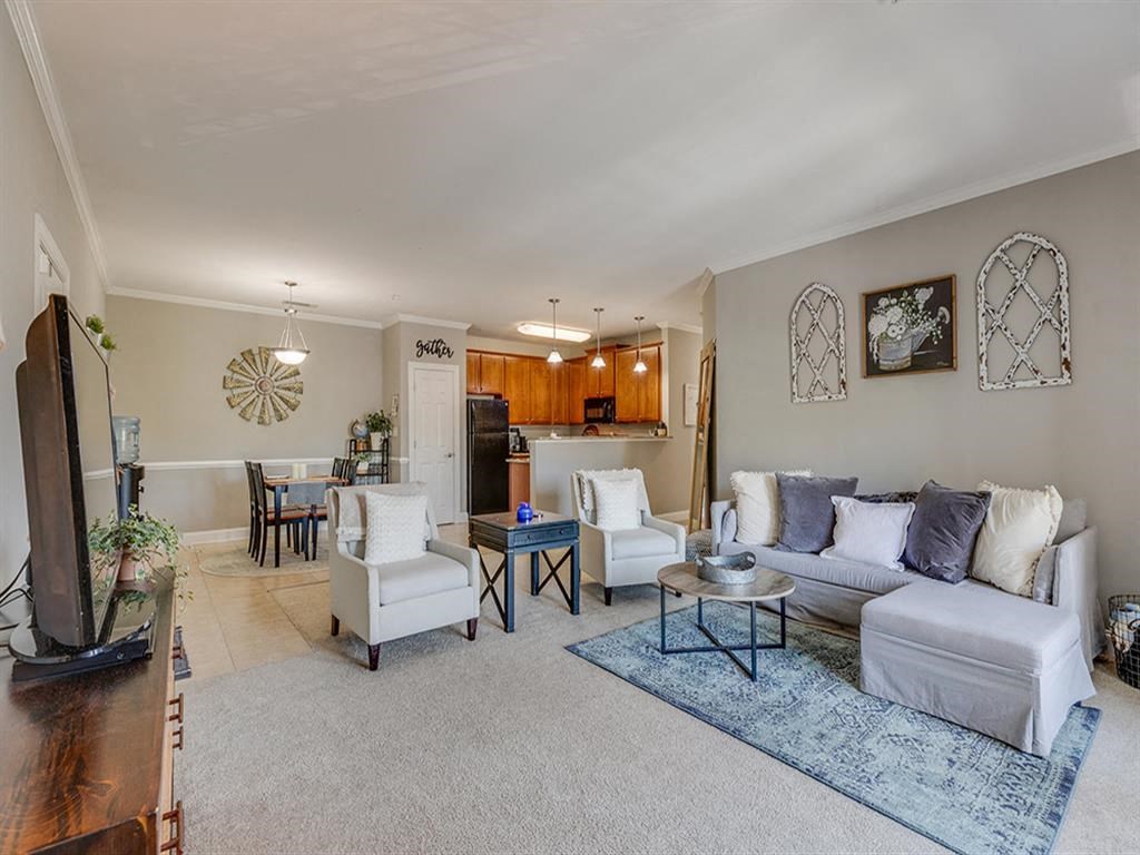 a living room with a couch and a table