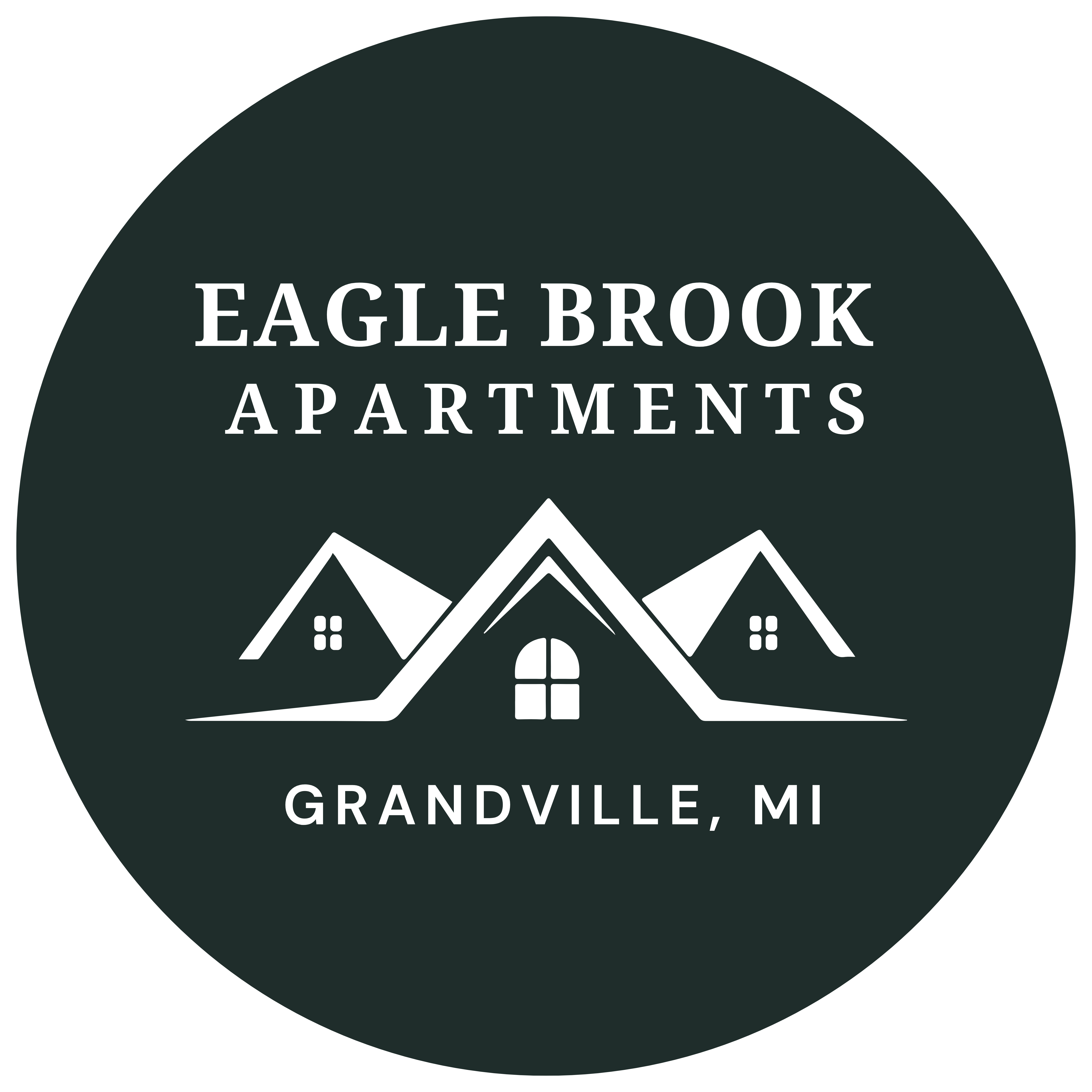 The image is a logo of Eagle Brook Apartments located in Grandville, MI.