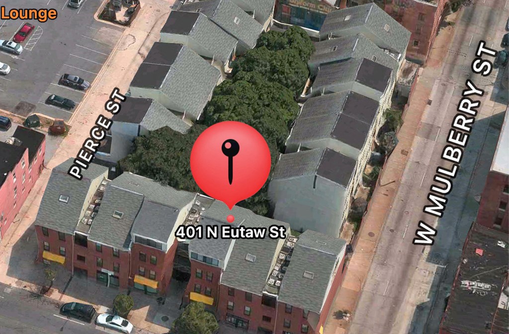 a screenshot of a google maps street view of a building with a gps tracker on it