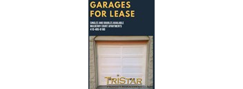a white garage door with a sign that reads garage for lease