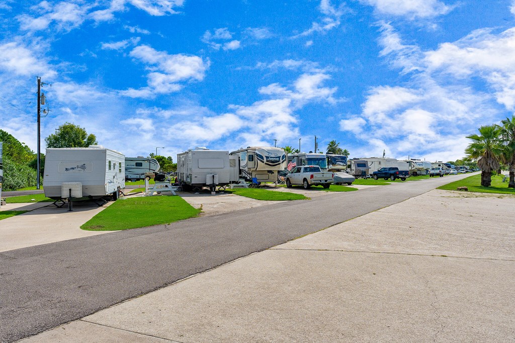 a row of rvs parked in a parking lot
