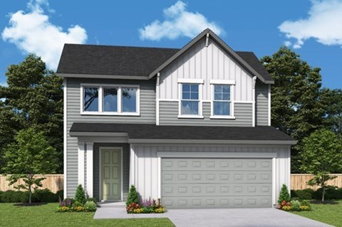 A modern house with a grey and white exterior and a black roof.