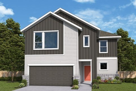 A modern house with a grey exterior and a red door.