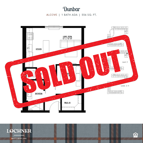 a red sold out sign in front of a house sold out