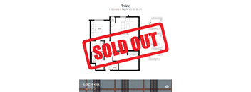 a red sold out sign in front of a house sold out