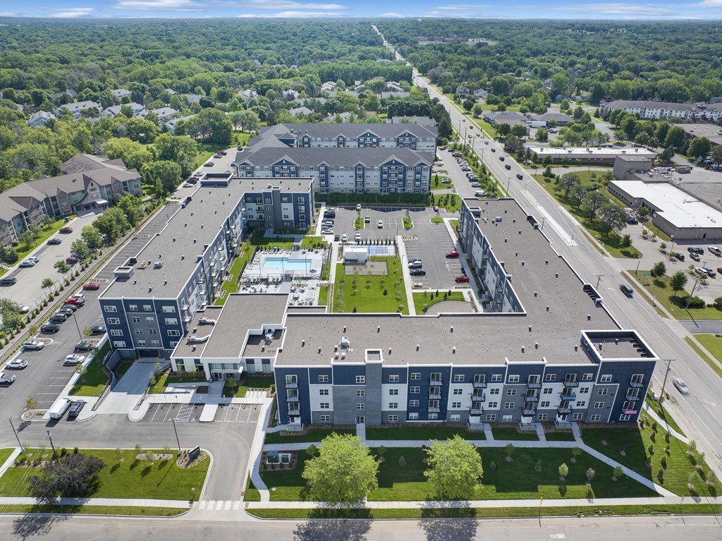 an aerial view of an apartment building from a drone