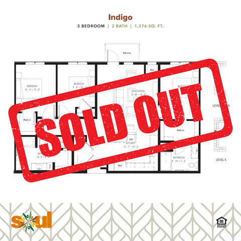 a red sold out sign in front of a sold out plot