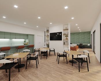 A modern dining room with wooden floors and white walls.