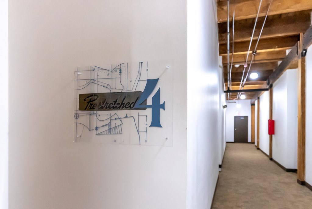 a painting on a wall in a corridor of a building