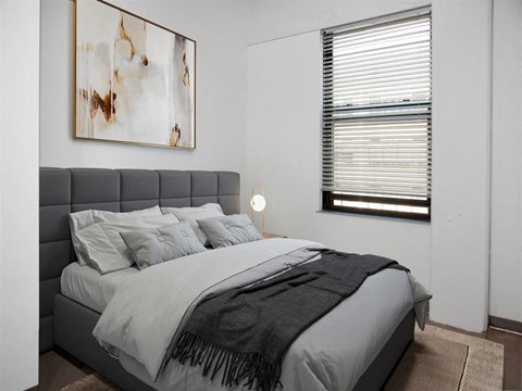 bedroom with window and bed