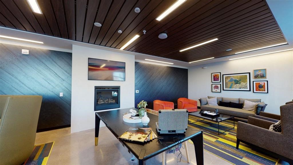 Lounge with fireplace and TV