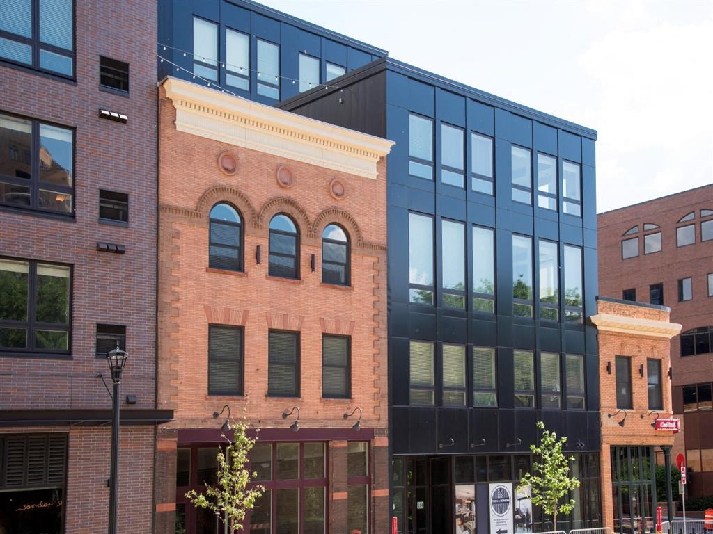 exterior of historic and modern apartment building