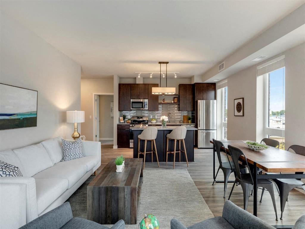 apartment with open layout to kitchen and dining room