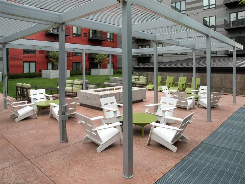 courtyard with firepit and pergola