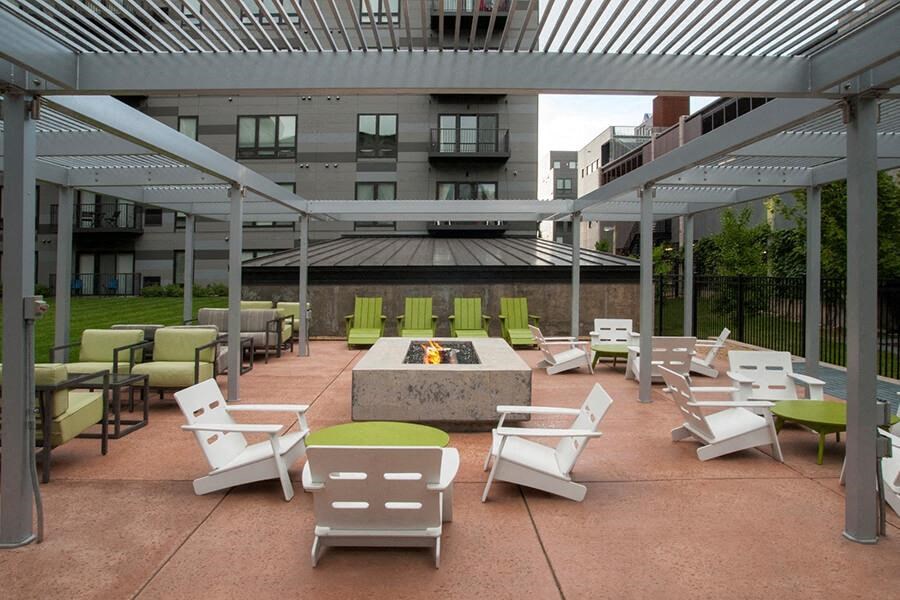 courtyard with firepit and chairs
