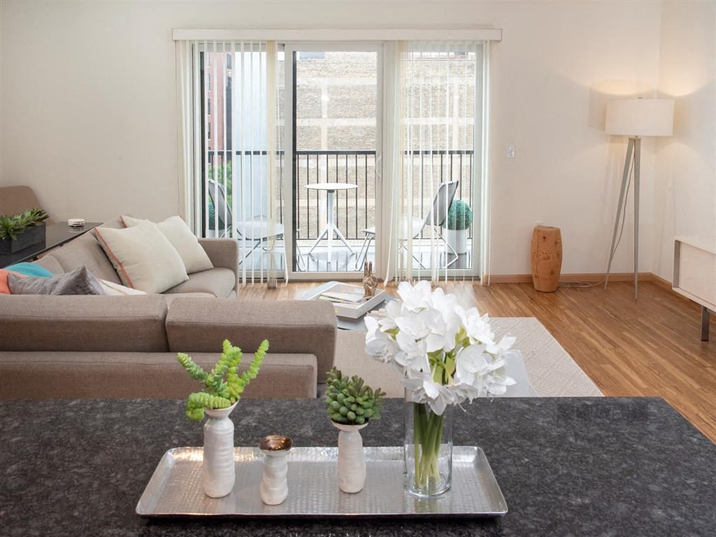 living room with patio door and balcony