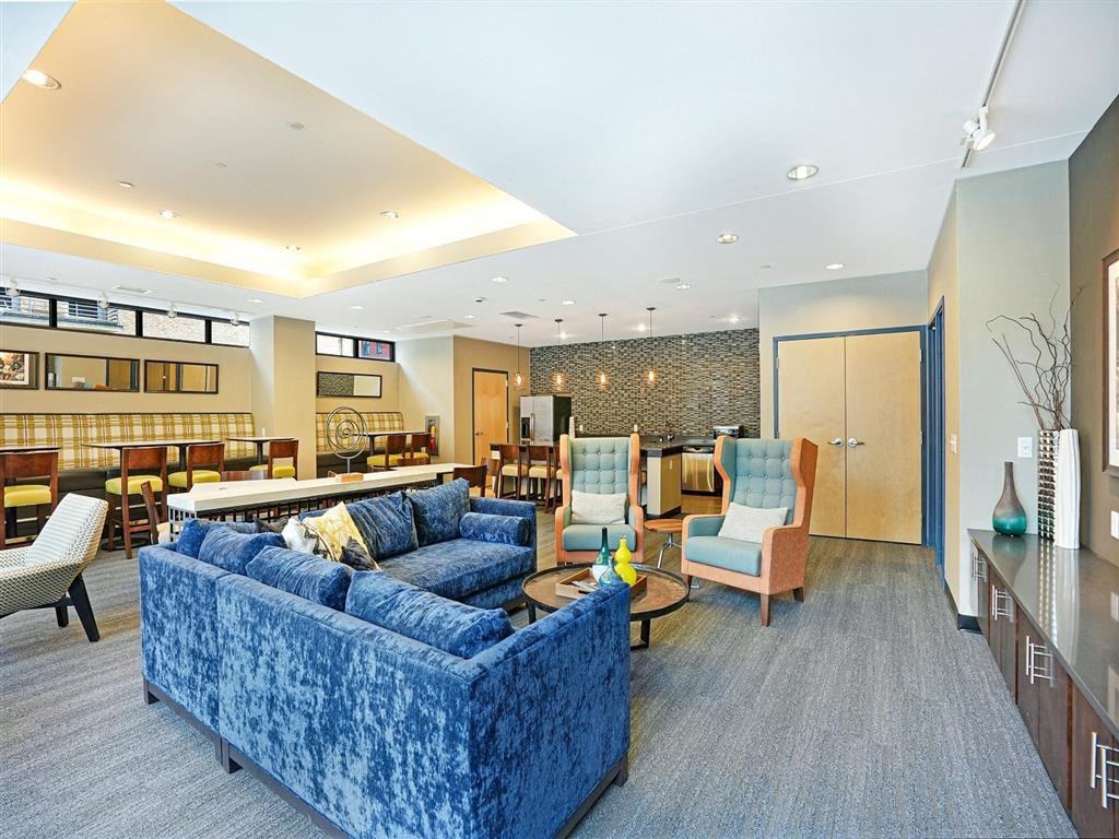 Community room with kitchen and coffee bar