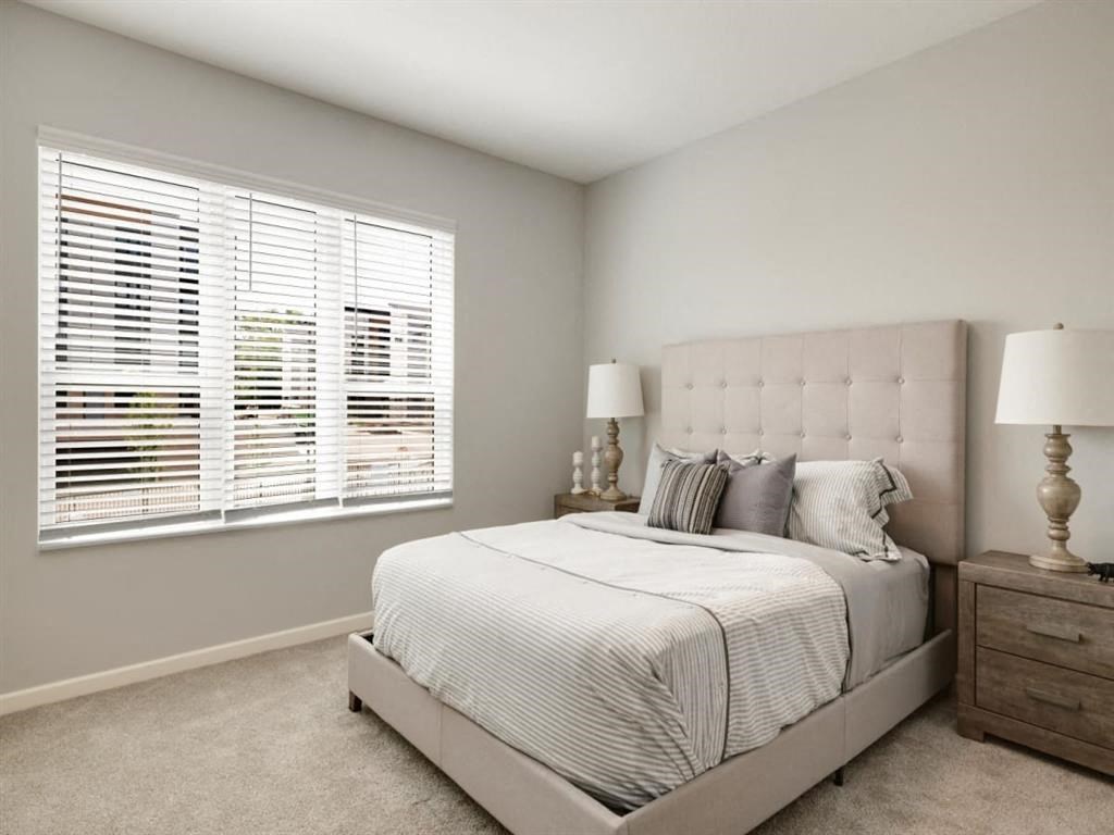 Large bedroom with windows