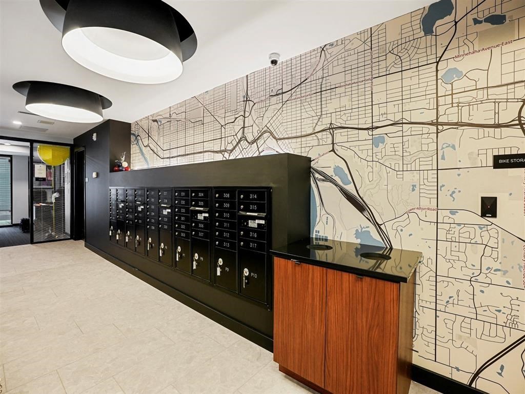 a map of los angeles is prominently displayed on the wall in the lobby of the building