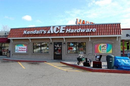 a hardware store with a sign on the front of it