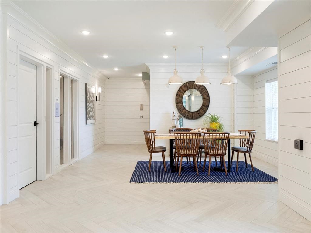 Large dining table in white lobby