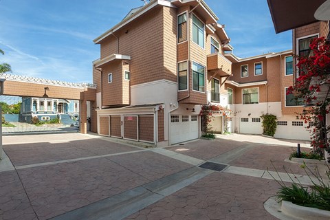 A large house with a driveway and garage.