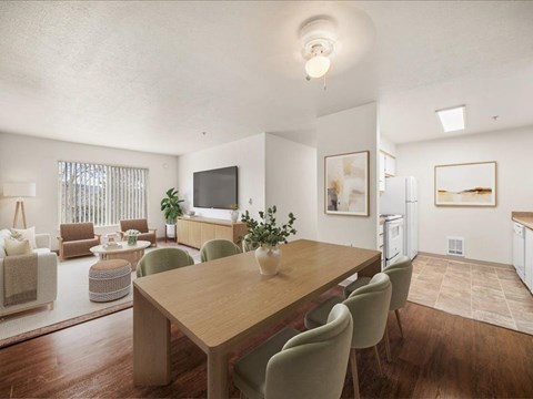 A dining room with a wooden table and chairs.