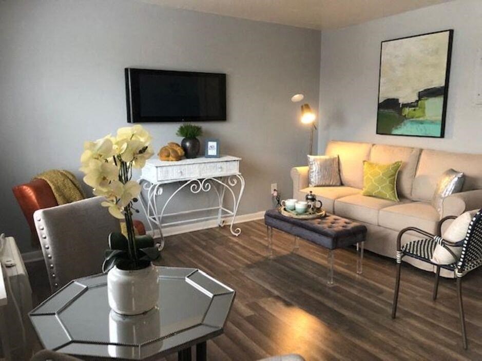 a living room with a couch and a table