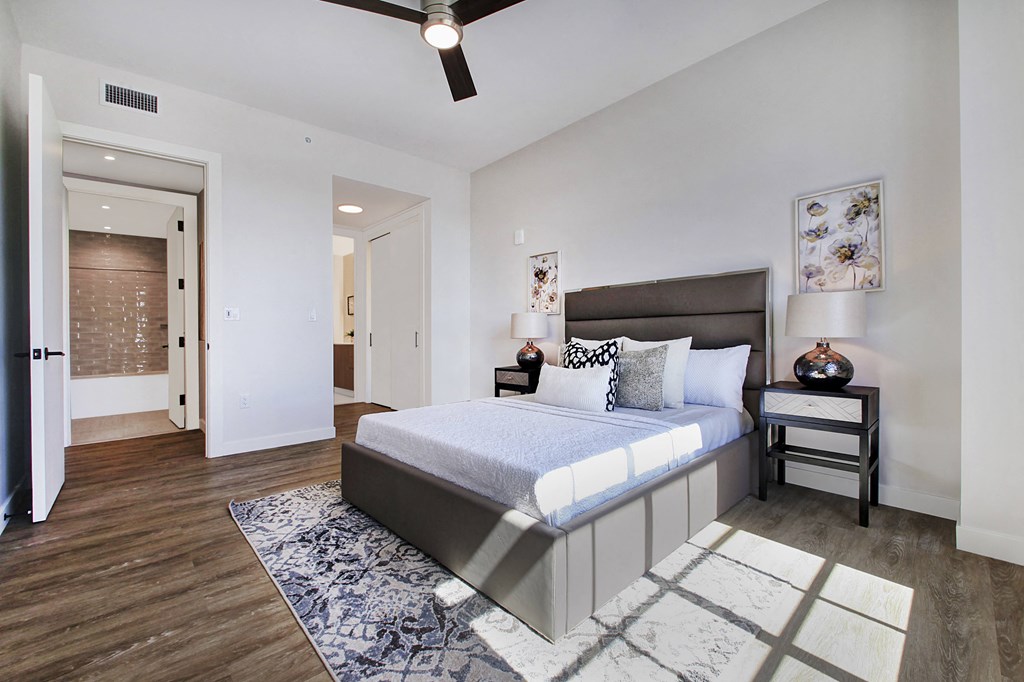 a bedroom with a bed and a closet