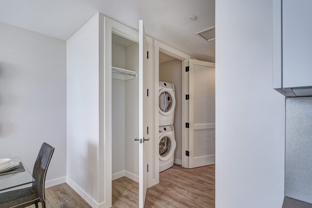 a small laundry room with a washer and dryer in a closet