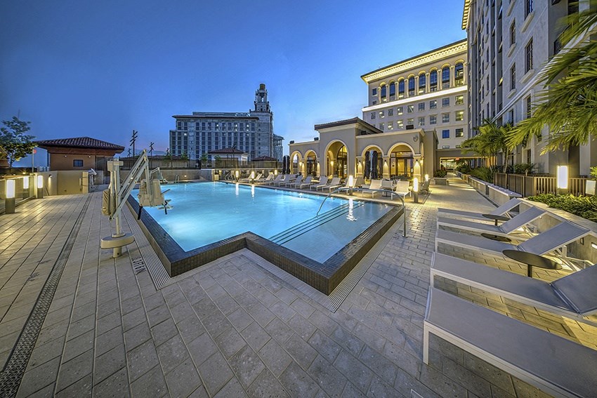 a swimming pool at night at the omni san francisco hotel