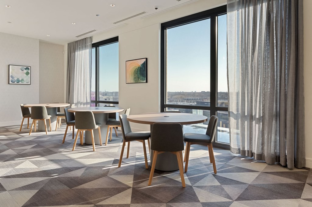 a room filled with furniture and a large window at Platform 4611, Chicago, IL 60640